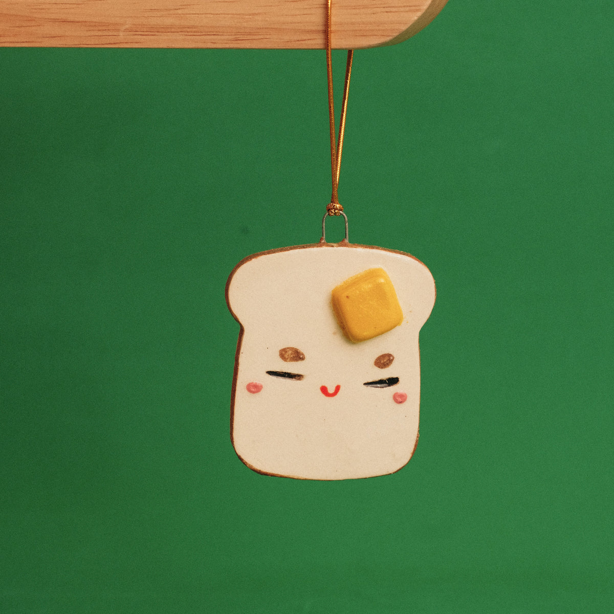 Toasty Butter Ceramic Ornament